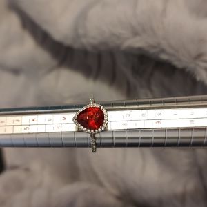 Stunning Red teardrop shaped faux stone surouned in .925 silver